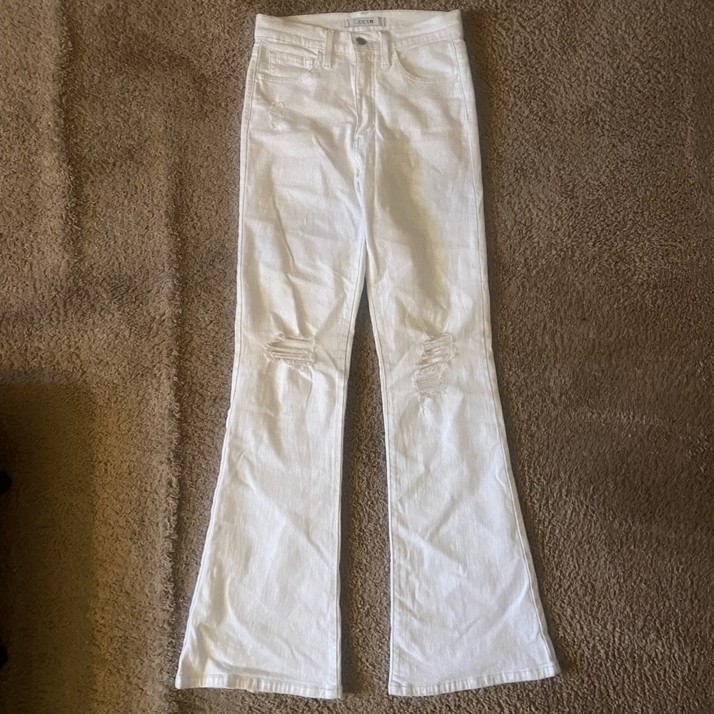 Joe’s Jeans white bootcut with knee rips